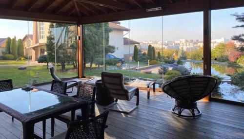 Раздвижные окна для террасы и веранды. Раздвижные окна для террас: особенности и преимущества 12 Раздвижные окна для террасы и веранды. Раздвижные окна для террас: особенности и преимущества 12